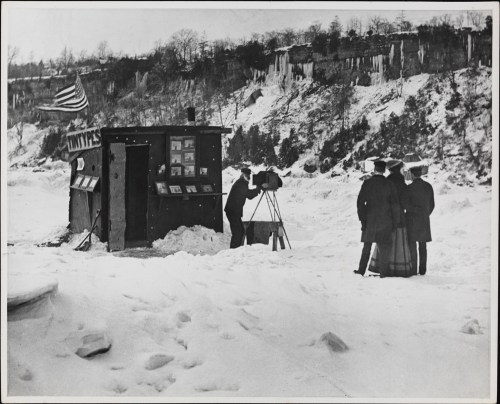  Robert L. Bracklow, Photographer taking a portrait outside of a tintypes booth in the snow, 1880. Museum of the City of New York, 93.91.271. 