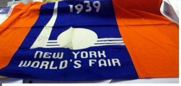 The World's Fair team uncovers a flag from the 1939 Fair.