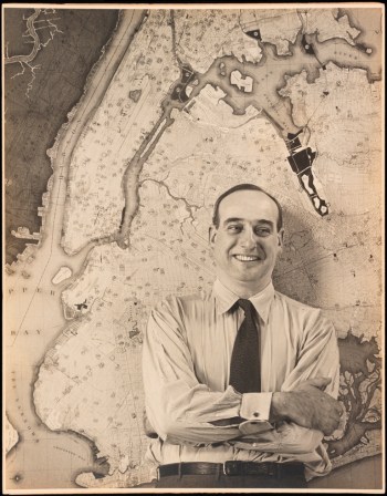 Unknown. Robert Moses in front of a map of New York City. ca. 1925-1940. Museum of the City of New York. F2012.58.960