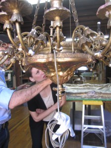 The author and master gilder Giovanni Bucchi examine the gilded surface
