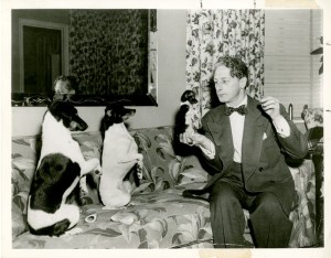 Dog trainer Paul Sydell and canine assistants Suzie, Smoothy, and Dingle-Dingle