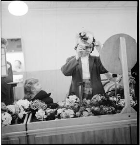 Stanley Kubrick for LOOK magazine, 1946. Women Trying on Hats [Woman trying on a hat in a department store.] ©SK Film Archives/Museum of the City of New York.
