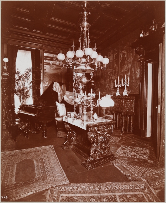 The music room of the Theodore (?--Henry Osborne?) Havemeyer (sugar refiner) residence at Madison Avenue and 38th Street. A piano and other furnishings are visible.