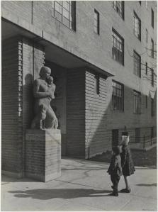 Samuel H. (Samuel Herman) Gottscho (1875-1971), Colored Concrete Statue "Motherhood", flanking passages to Great Court [at Harlem River Houses], 1936. Museum of the City of New York. 41.239.4
