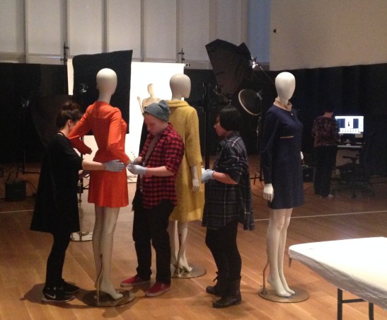 "Dressing Room" team preparing garments for photography.