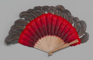 Brisé fan of red and brown feathers, ca. 1910. Museum of the City of New York, 69.102.10. 