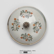 A painted teapot lid from Whitehall Slip.