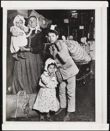 Alexander Alland and Lewis Wickes Hine (1874-1940). [Immigrants on Ellis Island.], ca. 1905. Museum of the City of New York, X2010.11.9996.