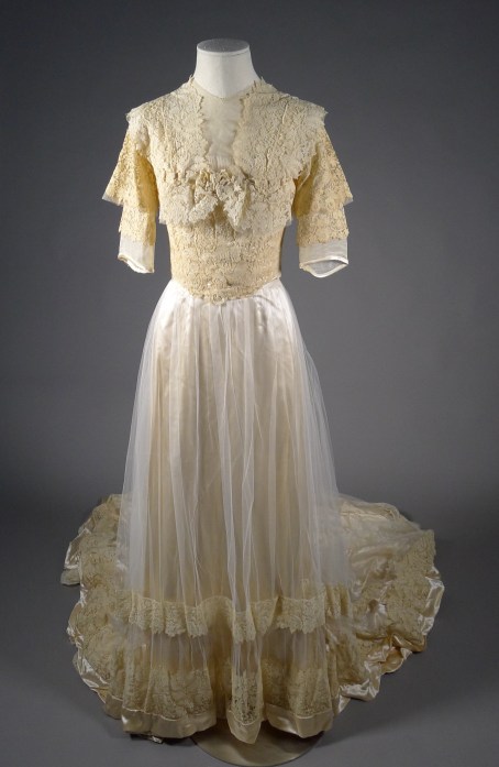 Wedding dress in cream slipper satin and lace, worn by Mrs. Theodore Roosevelt, Jr. at her wedding on June 20, 1910, at the Fifth Avenue Presbyterian Church. Museum of the City of New York, 81.100.1AB. Gift of Mrs. William McMillan. 